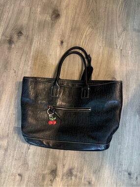 Dooney & Bourke Black Embossed Leather Tote with Cherry Charm